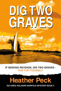 A lone yacht sales down a Norfolk river, against an orange sky