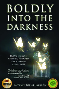 Glowing butterflies coming out of a jar on a black background, shining in the darkness.