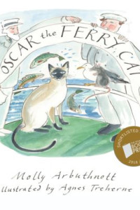 Oscar the Ferry Cat surrounded by the chef and captain