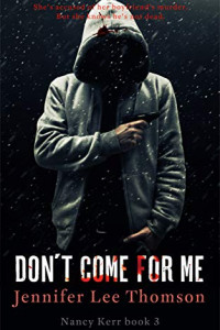 Strange man in a hooded jacket with a gun.