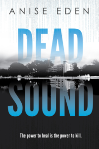 Cover of Dead Sound (Things Unseen Series, Book 1): The title in blue overlaying a black and white photograph of a hospital and its reflection in a body of water.
