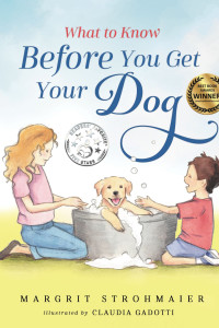 Boy and girl giving a dog a bath