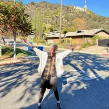 Rochelle Staab under the Hollywood sign